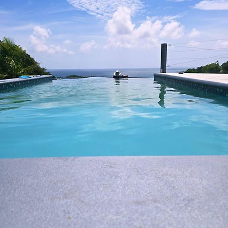 Hodges Bay House Apartment Calibishie Bagian luar foto