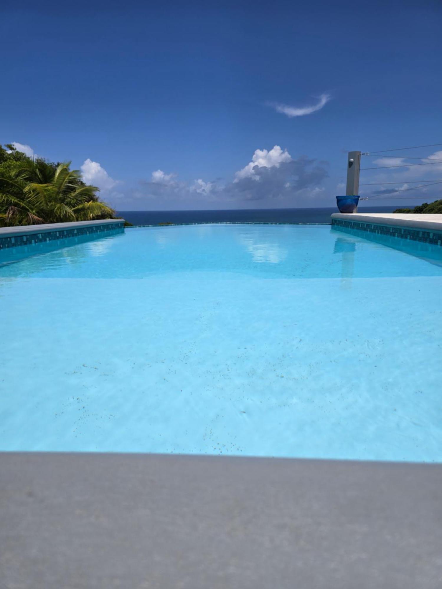 Hodges Bay House Apartment Calibishie Bagian luar foto