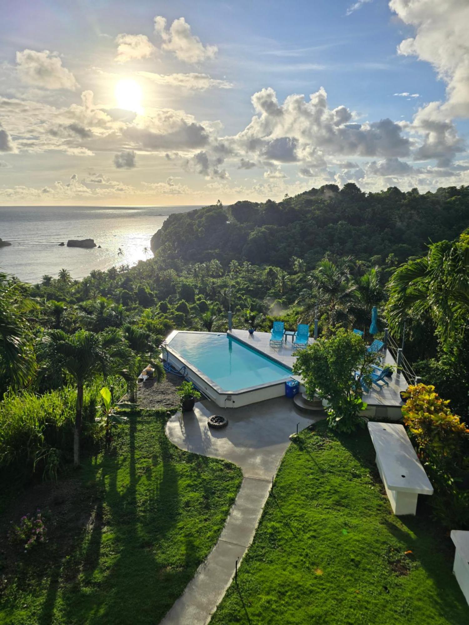 Hodges Bay House Apartment Calibishie Bagian luar foto