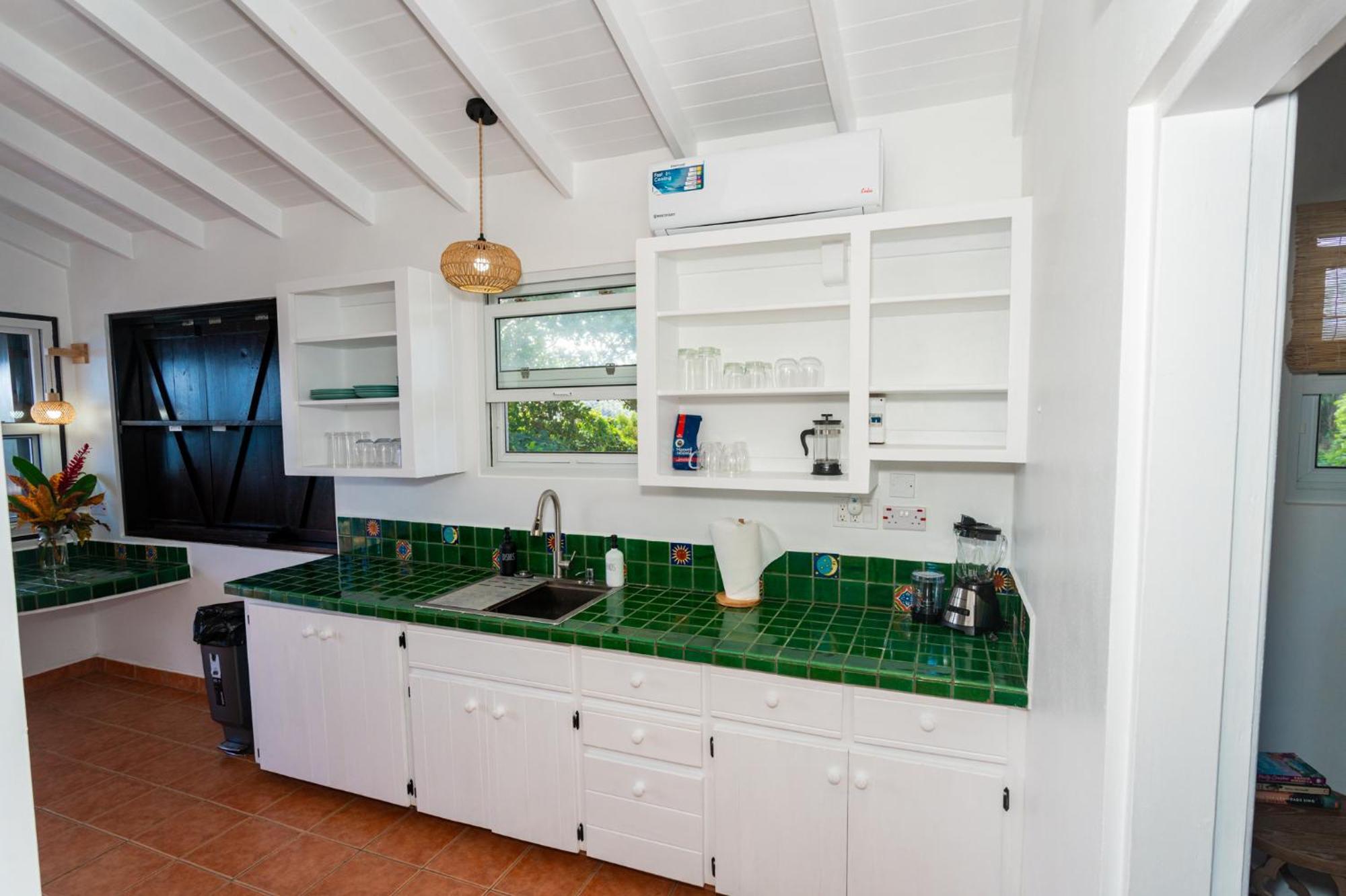 Hodges Bay House Apartment Calibishie Bagian luar foto